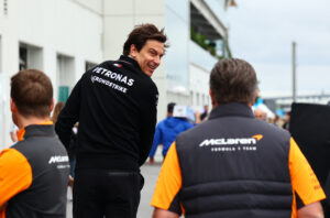 Toto Wolff, Zak Brown,