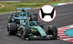 Mercedes Formula 1 car on a race track with red curb markings; a red-outlined circular icon showing a black-and-white symbol appears in the top-right.