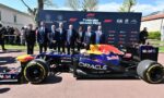 Red Bull Formula 1 car on display with officials and photographers at the Turkish Grand Prix 2027 backdrop in a sunny area.