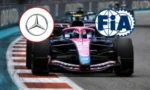 Pink Formula 1 race car speeding along a circuit with Mercedes and FIA logos overlaid above it