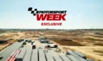 Motorsport Week Exclusive logo above a race track with cars and construction on a clear day.
