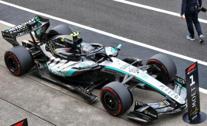 Mercedes AMG Petronas Formula 1 car parked on the pit lane with sponsor logos visible