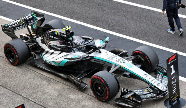 Mercedes AMG Petronas Formula 1 car parked on the pit lane with sponsor logos visible