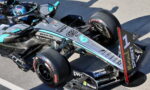 Mercedes-AMG Petronas Formula 1 car with number 1, parked on the track showing sponsor logos like Petronas Syntium and Microsoft on the bodywork