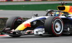 Red Bull Racing Formula 1 car on track, close-up of front wing and tire with sponsor logos (Cash App, Oracle) visible on body.