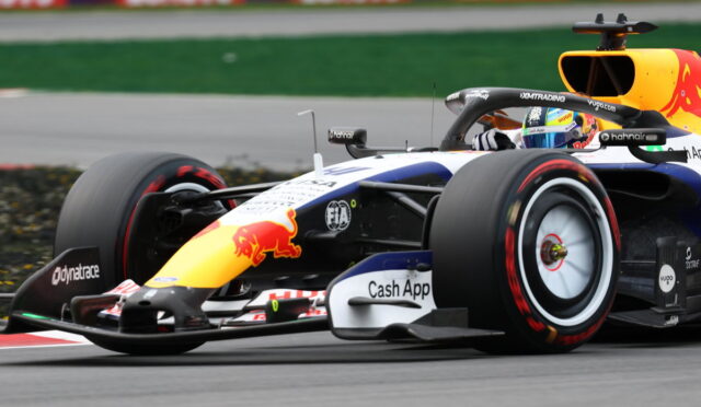 Red Bull Racing Formula 1 car on track, close-up of front wing and tire with sponsor logos (Cash App, Oracle) visible on body.