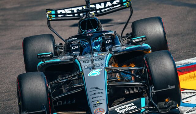 Mercedes‑AMG Petronas Formula 1 car on track, front view showing sponsor logos and teal accents