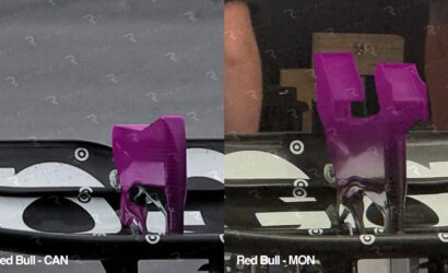 Close-up of a car instrument panel with two purple shift paddles and event labels ‘Red Bull - CAN’ and ‘Red Bull - MON’ at the bottom.