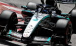 Mercedes-AMG Petronas Formula One car on a race track, front view with sponsor logos visible