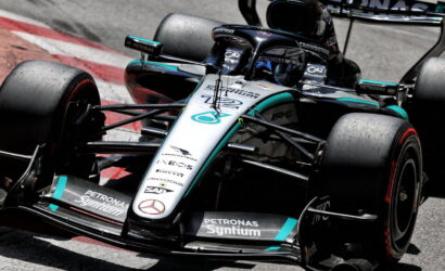 Mercedes-AMG Petronas Formula One car on a race track, front view with sponsor logos visible