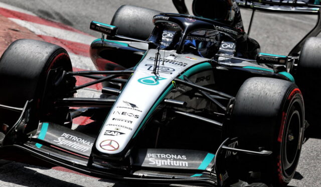 Mercedes-AMG Petronas Formula One car on a race track, front view with sponsor logos visible